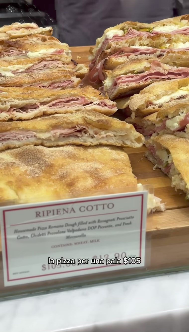 Pizza in pala ripiena di Prosciutto Cotto, provolone e mozzarella: 105$ una intera